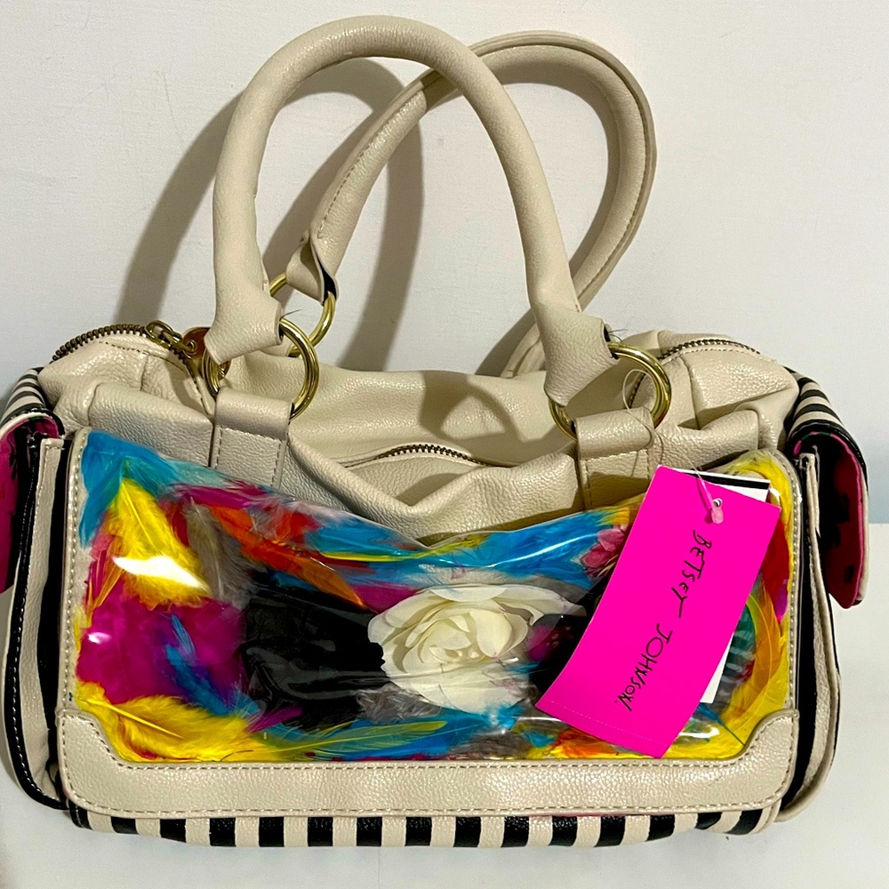 Betsey Johnson new with tags feather pocket bag good condition.